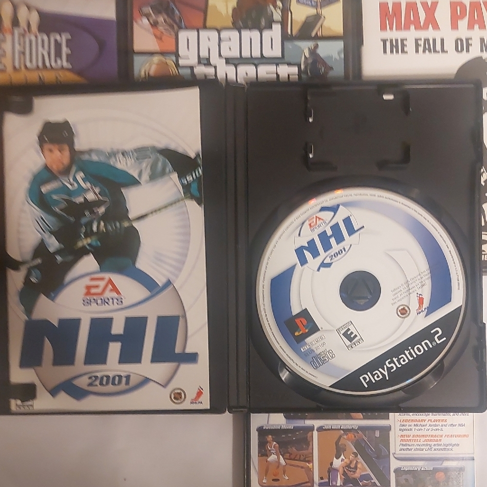 Sony PlayStation 2 Game Collection - Black, Orange, White - Picture 6 of 7
